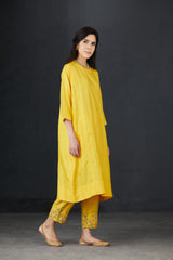 Perforated seam tunic with intricate hand embroidered Pants