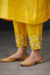 Perforated seam tunic with intricate hand embroidered Pants