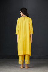 Perforated seam tunic with intricate hand embroidered Pants