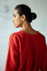 Tunic with rounded hem